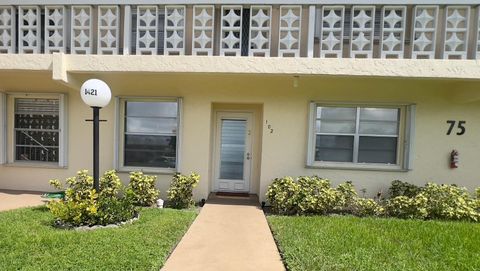 Photo of 1421 NW 19th Terrace #102, Delray Beach, FL 33445 (MLS # RX-11129709)