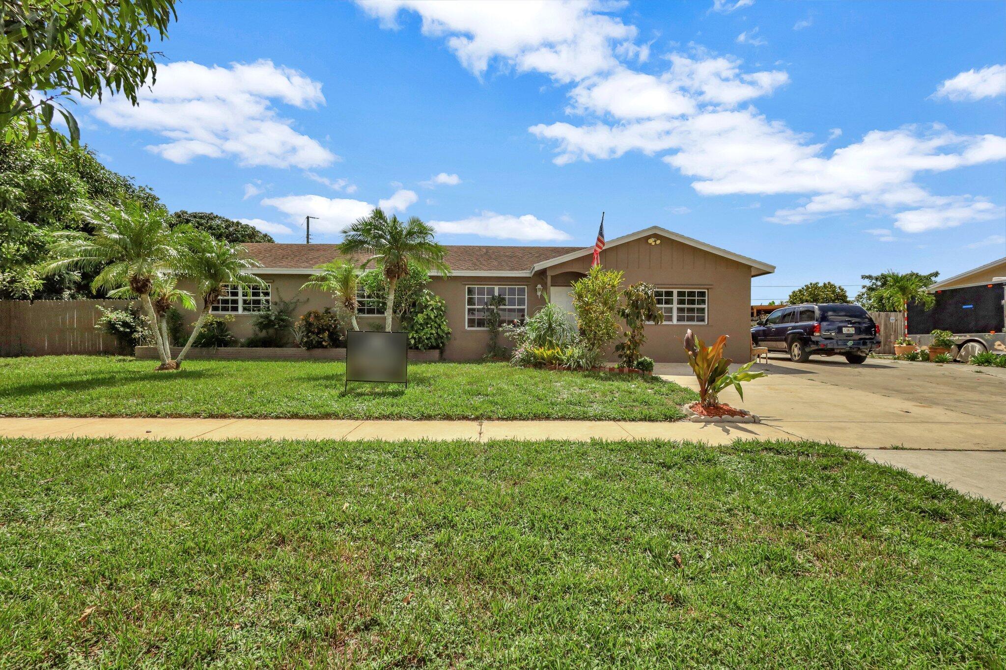 1542 Roy Drive, West Palm Beach, Palm Beach County, Florida - 4 Bedrooms  
2 Bathrooms - 
