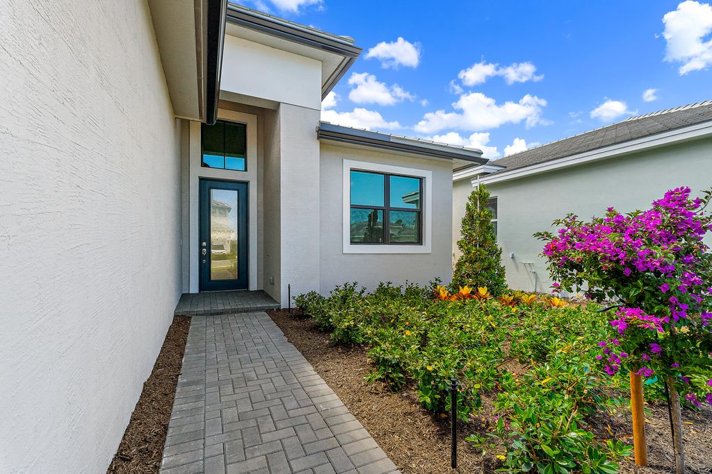 Photo of 7050 SE Haven Lane, Stuart, FL 34997 (MLS # RX-11126184)