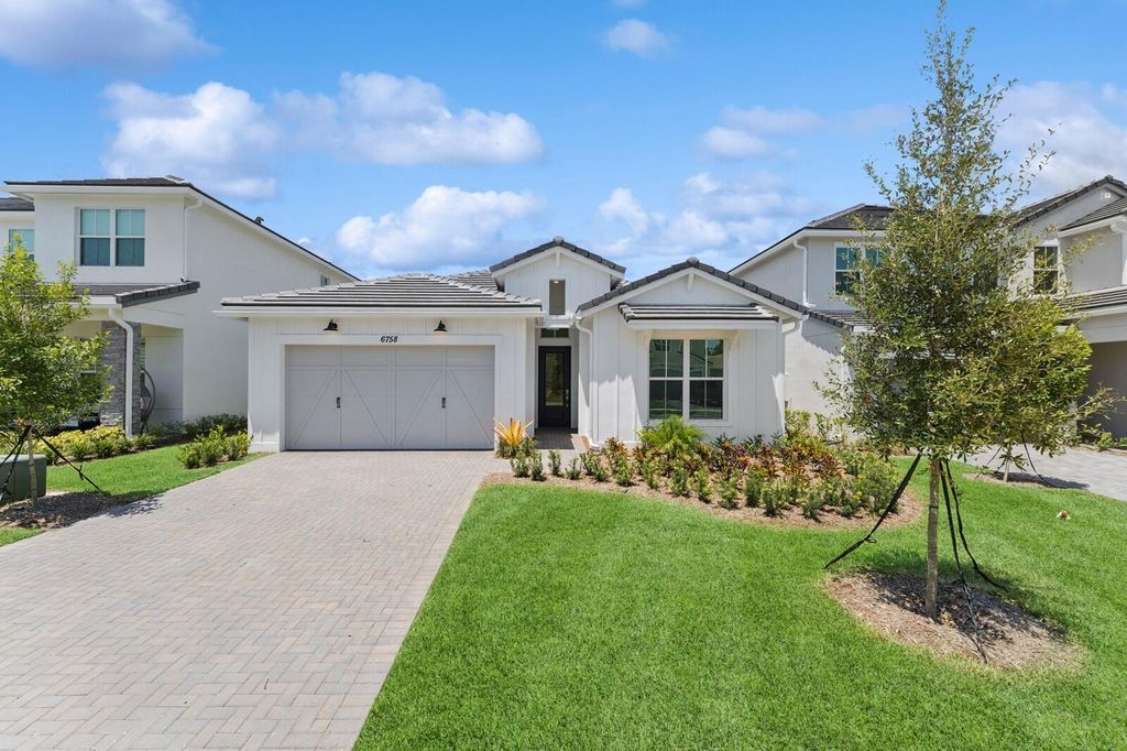 Photo of 6758 SE Lost Pine Drive #21, Stuart, FL 34997 (MLS # RX-11082702)