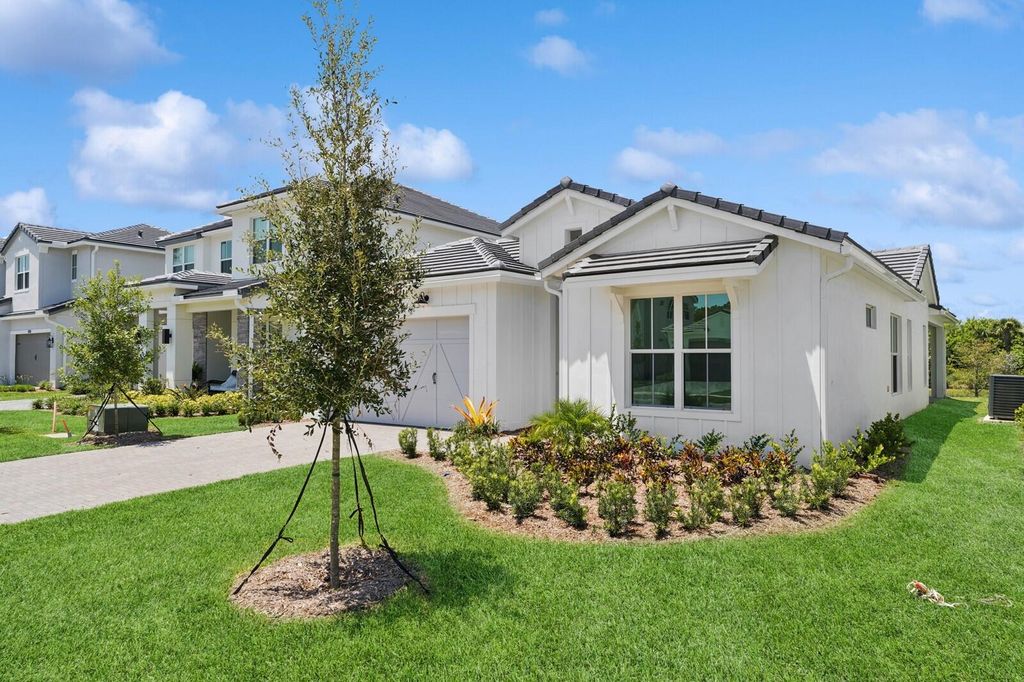 Photo of 6758 SE Lost Pine Drive #21, Stuart, FL 34997 (MLS # RX-11082702)