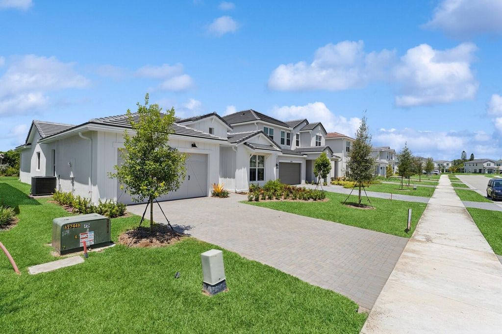 Photo of 6758 SE Lost Pine Drive #21, Stuart, FL 34997 (MLS # RX-11082702)