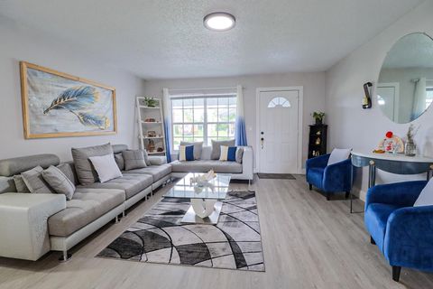 Photo of 855 Azalea Drive, Royal Palm Beach, FL 33411 (MLS # RX-11118503)