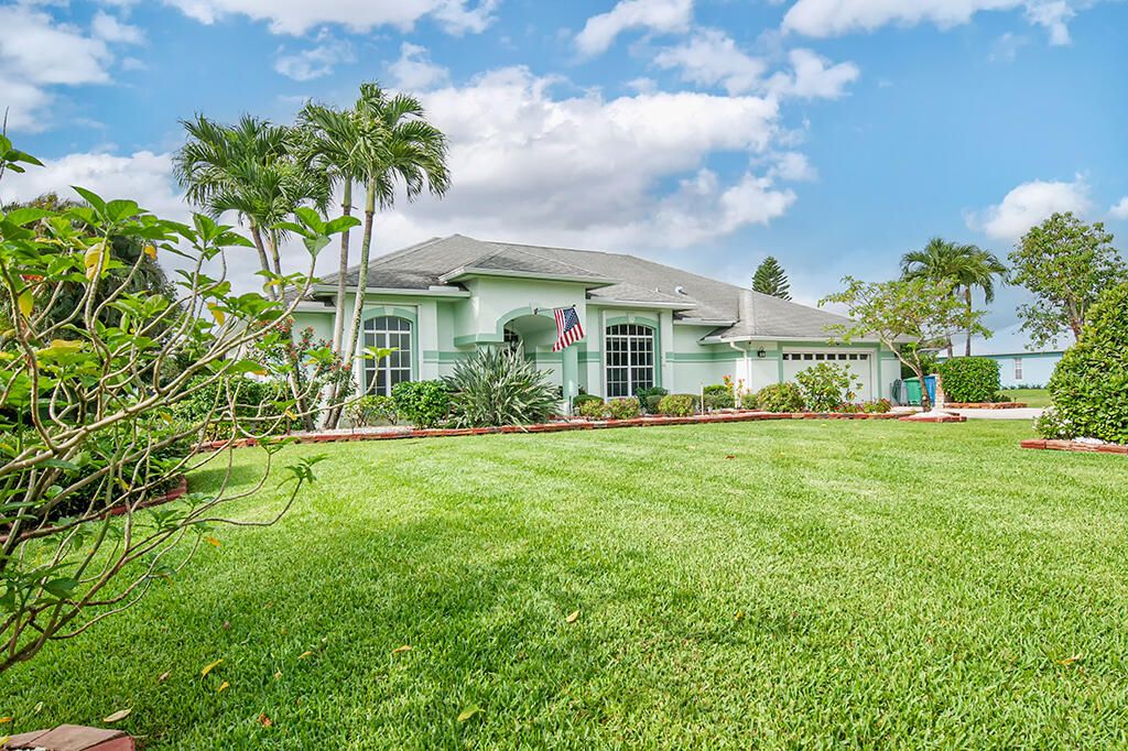 Photo of 2608 SW River Shore Drive, Port Saint Lucie, FL 34984 (MLS # RX-10802691)