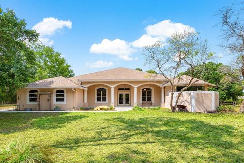 Photo of 16737 Temple Boulevard, Loxahatchee, FL 33470 (MLS # RX-11089006)