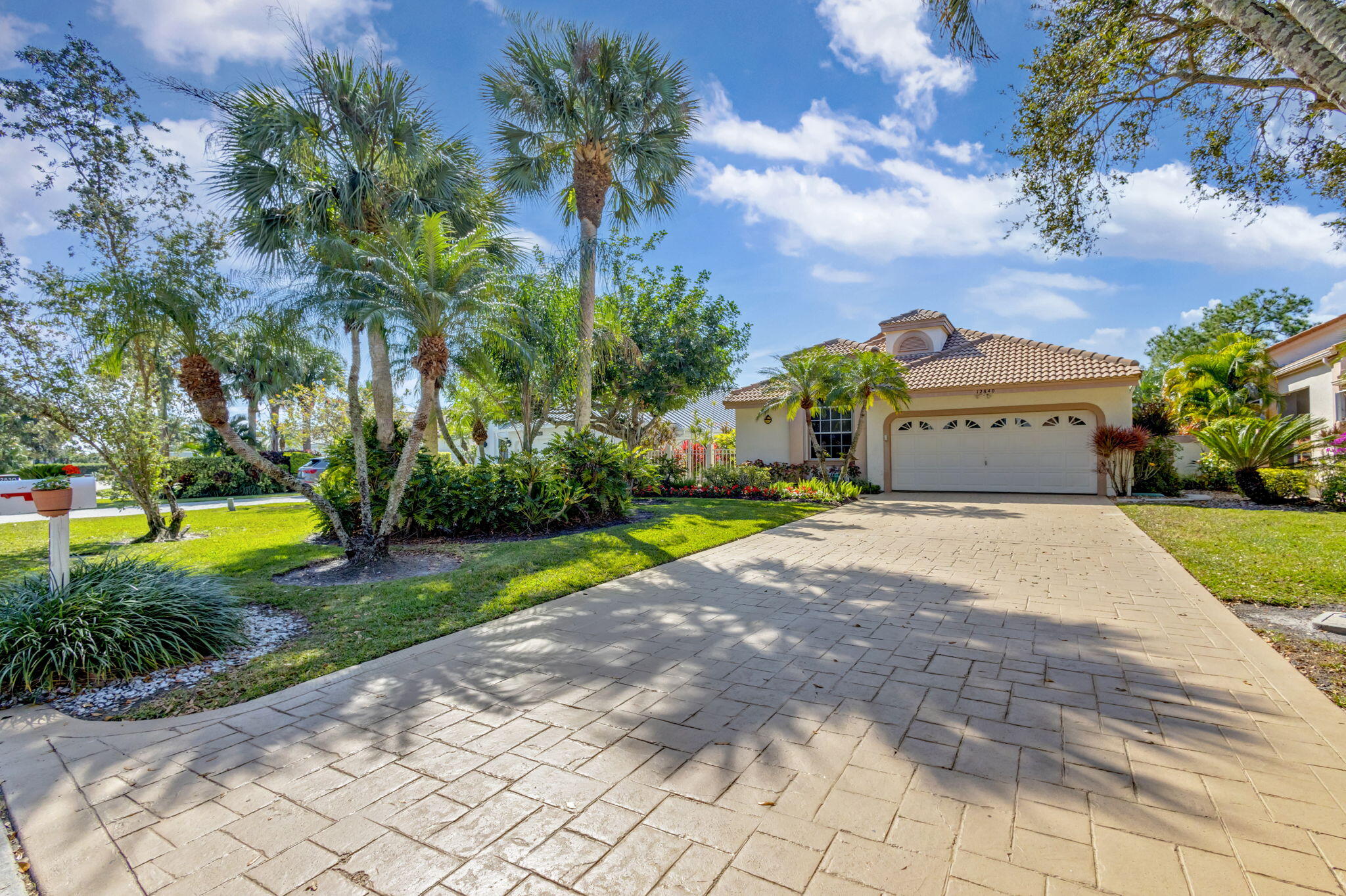 Property for Sale at 12840 Oak Knoll Drive, Palm Beach Gardens, Palm Beach County, Florida - Bedrooms: 2 
Bathrooms: 2  - $754,000