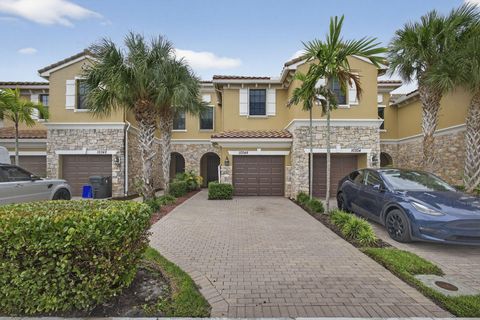 Photo of 10348 Wellington Parc Drive, Wellington, FL 33449 (MLS # RX-11122270)