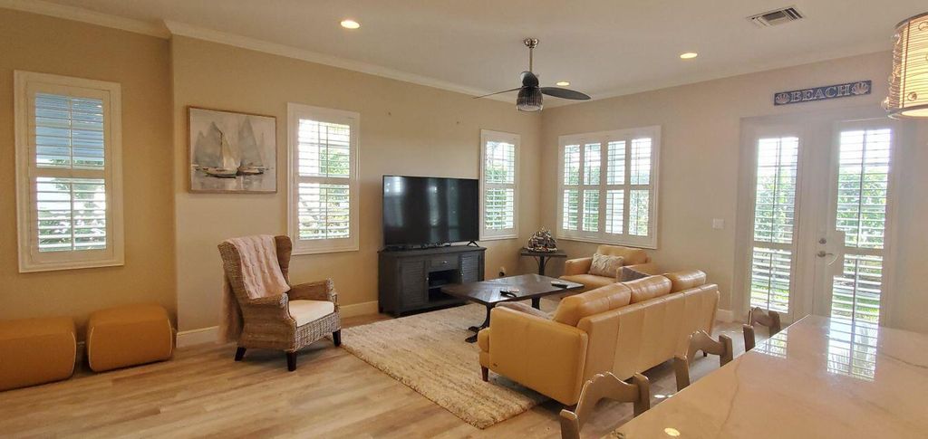 Photo of 136 Ocean Breeze Drive, Juno Beach, FL 33408 (MLS # RX-10873450)