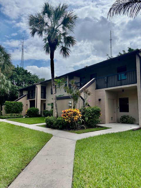 Photo of 8299 Boca Glades Boulevard E, Boca Raton, FL 33434 (MLS # RX-11128072)
