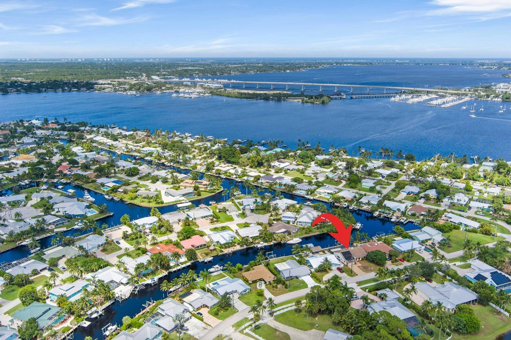 Photo of 1545 SW Dyer Point Road, Palm City, FL 34990 (MLS # RX-11116141)