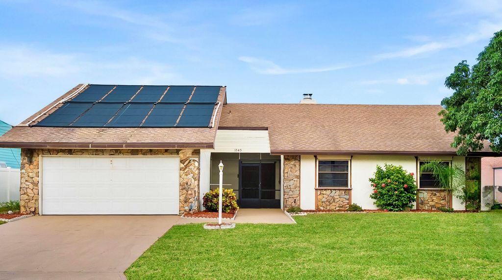 Photo of 1545 SW Dyer Point Road, Palm City, FL 34990 (MLS # RX-11116141)