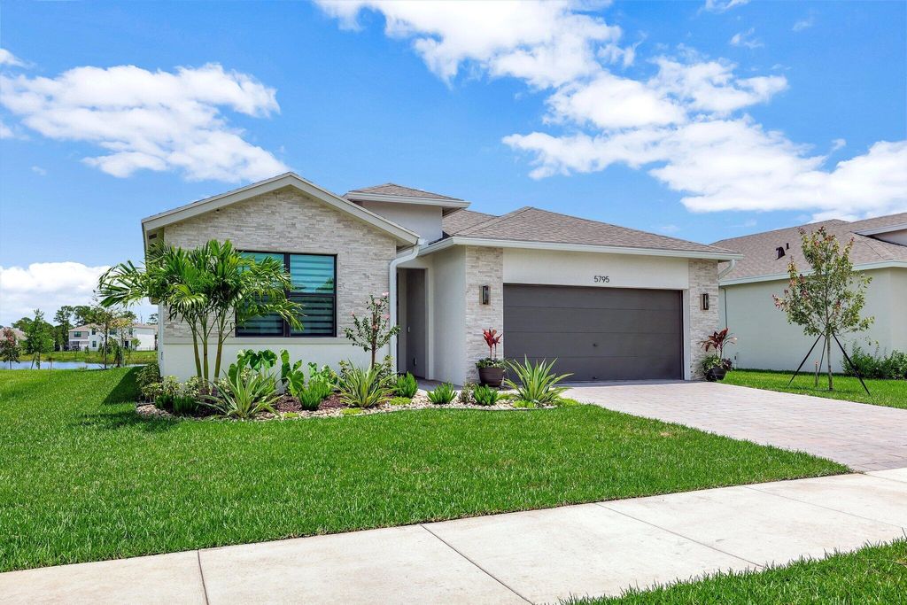 Photo of 5795 SE Sky Blue Circle, Stuart, FL 34997 (MLS # RX-11112590)