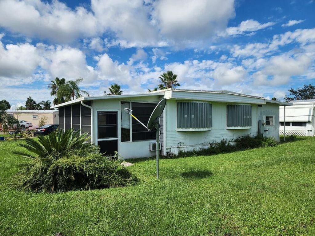 Photo of 10 San Juan Lane, Port Saint Lucie, FL 34952 (MLS # RX-11117648)