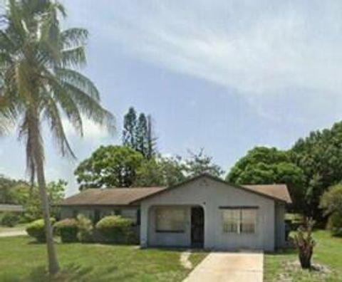 Photo of 2701 NW Essex Drive NW, Fort Pierce, FL 34946 (MLS # RX-11123853)