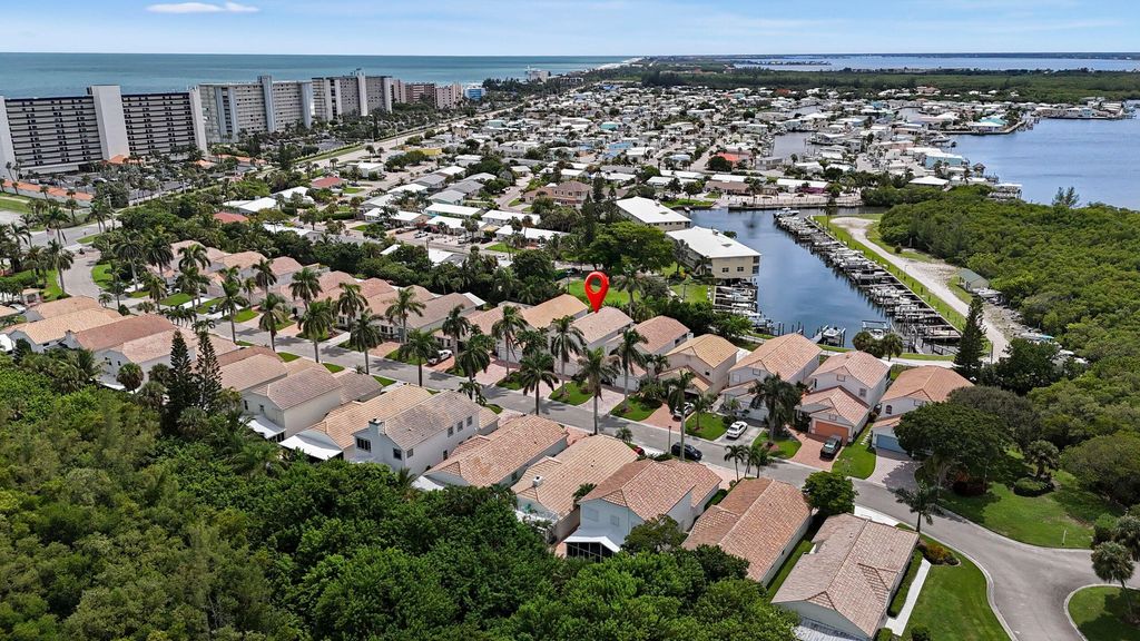 Photo of 143 Pepper Lane, Jensen Beach, FL 34957 (MLS # RX-11121120)