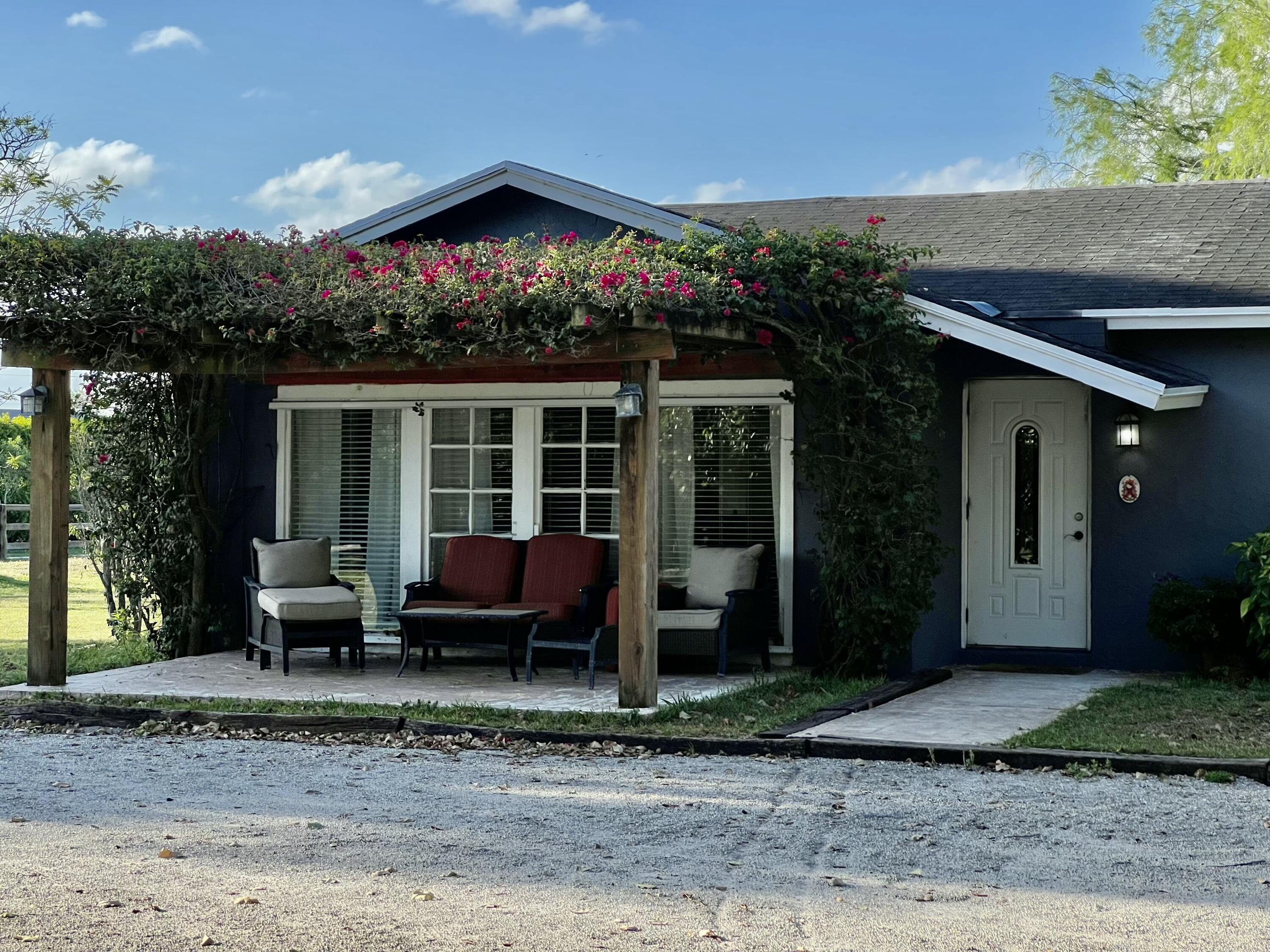 16163   16097 Rustic Road, Wellington, Palm Beach County, Florida - 4 Bedrooms  
2.5 Bathrooms - 