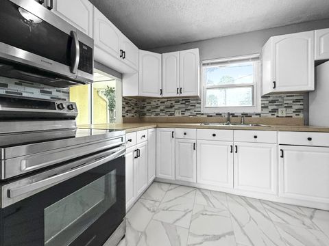 Photo of 4679 Martha Louise Drive, West Palm Beach, FL 33417 (MLS # RX-11125120)