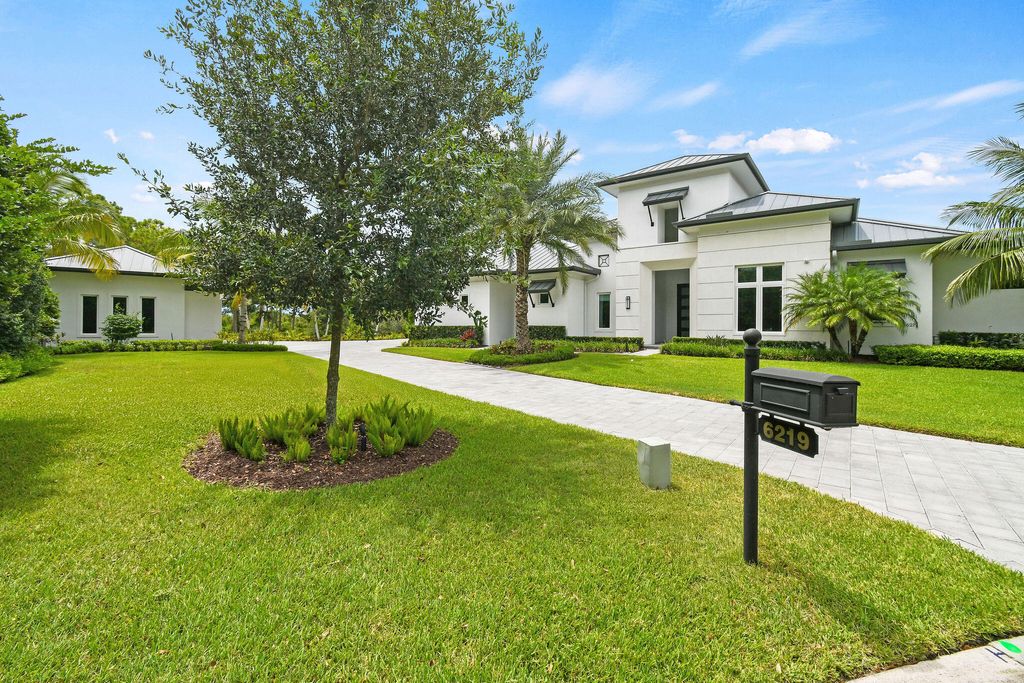 Photo of 6219 SE Moss Ridge Pointe, Hobe Sound, FL 33455 (MLS # RX-11120220)