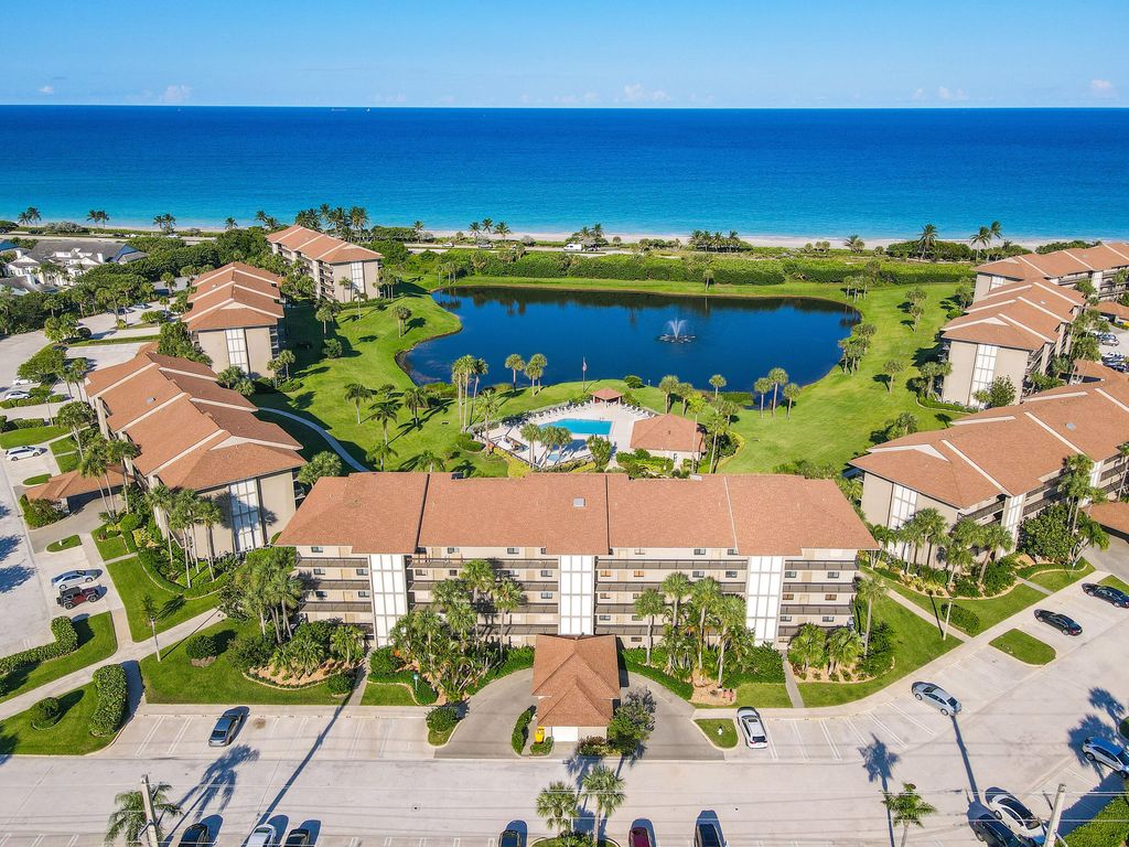 Photo of 101 S Seas Drive #101, Jupiter, FL 33477 (MLS # RX-11122067)