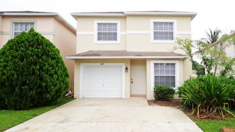 Photo of 62 Plumage Lane, West Palm Beach, FL 33415 (MLS # RX-11125490)