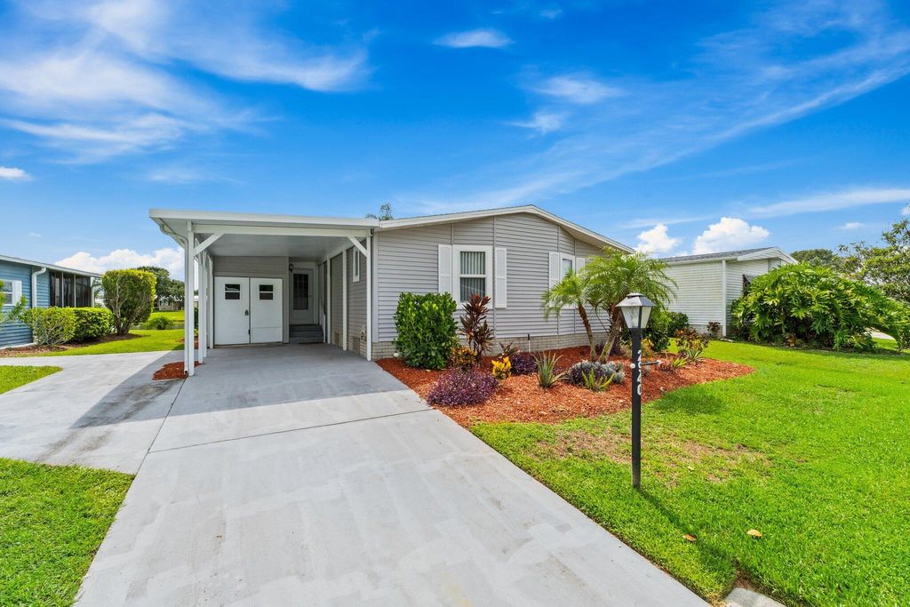 Photo of 2940 Fiddlewood Circle, Port Saint Lucie, FL 34952 (MLS # RX-11107119)