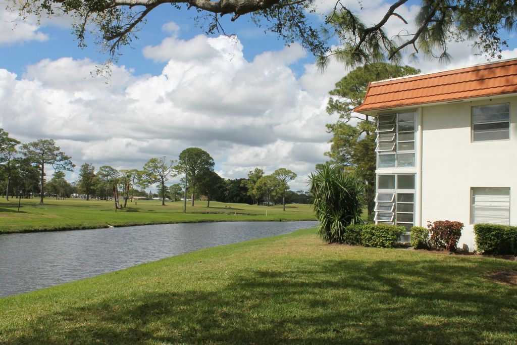 Photo of 1225 NW 21st Street #21-2115, Stuart, FL 34994 (MLS # RX-11065806)