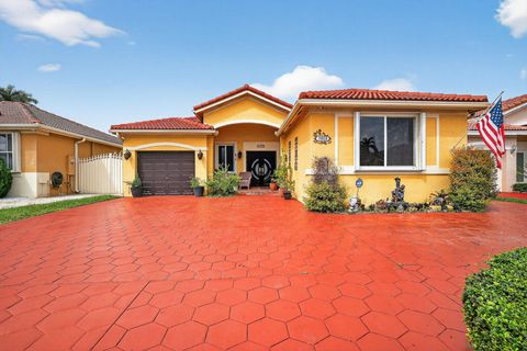 Photo of 19828 NW 81st Place, Hialeah, FL 33015 (MLS # RX-11129517)