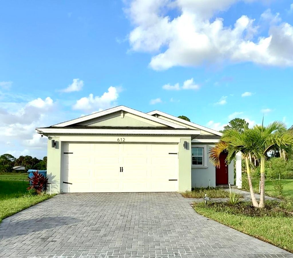 Photo of 612 Papillon Street SW, Palm Bay, FL 32908 (MLS # RX-11128708)