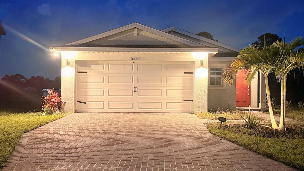 Photo of 612 Papillon Street SW, Palm Bay, FL 32908 (MLS # RX-11128708)