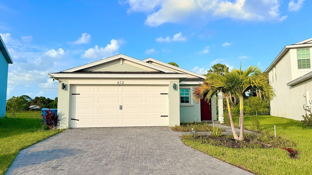 Photo of 612 Papillon Street SW, Palm Bay, FL 32908 (MLS # RX-11128708)
