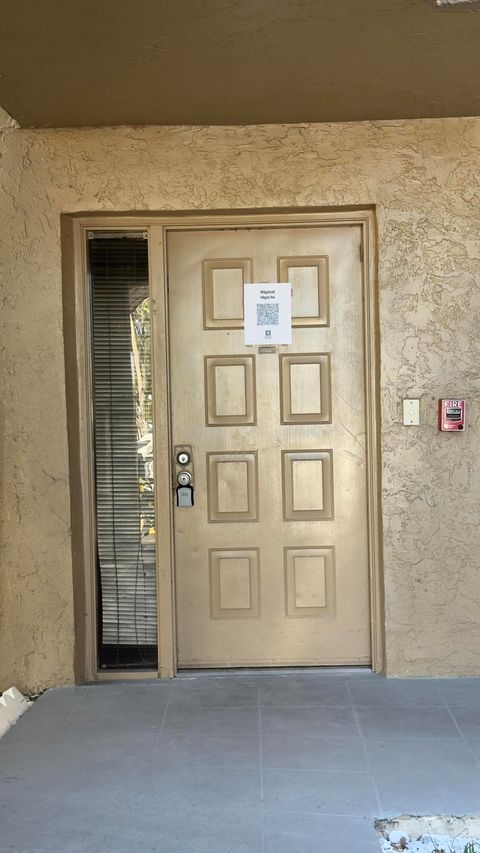 Photo of 8030 Hampton Boulevard #106, North Lauderdale, FL 33068 (MLS # RX-11111693)