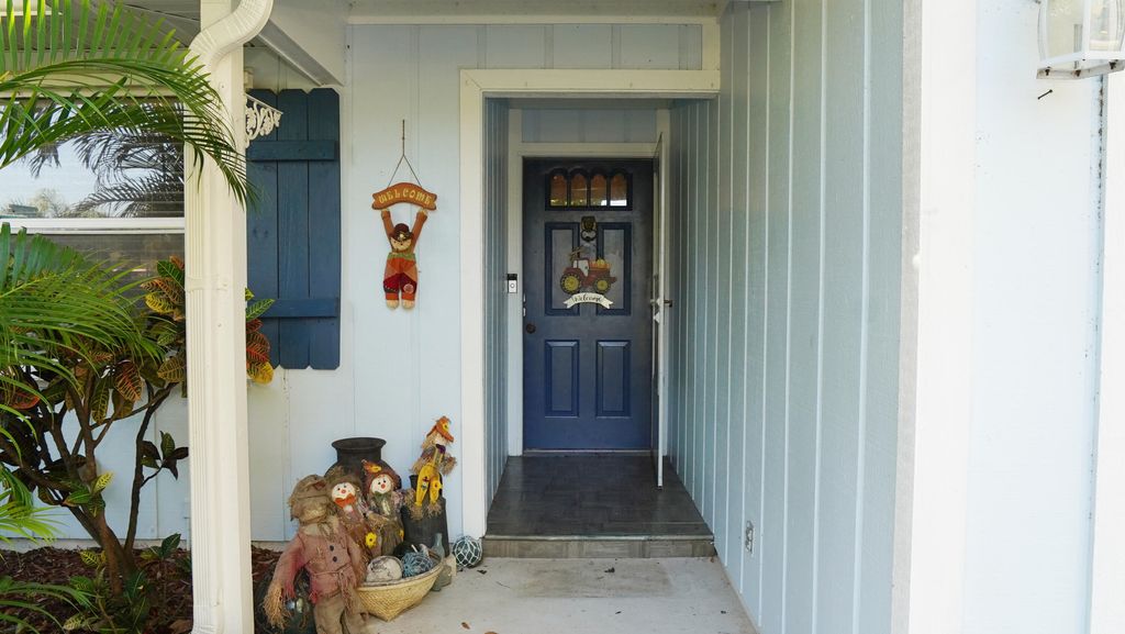 Photo of 1904 NE Avenida Dracaena, Jensen Beach, FL 34957 (MLS # RX-10848423)