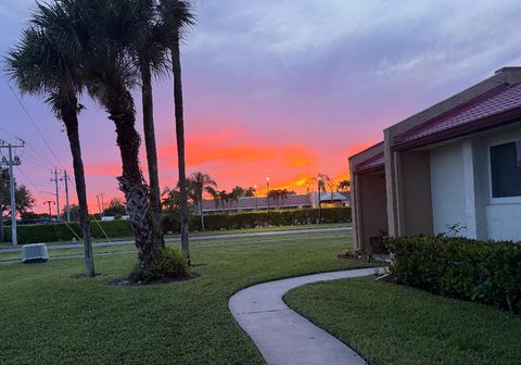 Photo of 101 Golden River Drive, Royal Palm Beach, FL 33411 (MLS # RX-11119339)