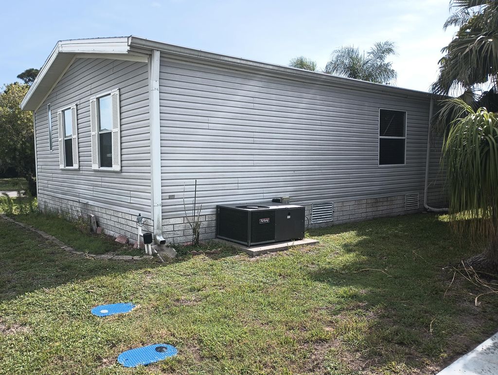 Photo of 523 Thames Bluff Ridge, Fort Pierce, FL 34982 (MLS # RX-11098580)