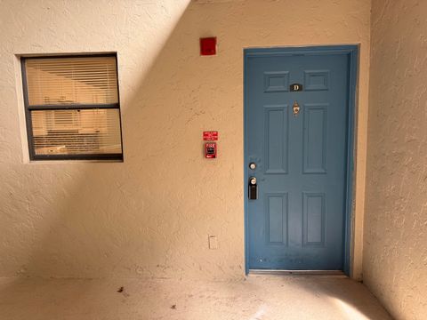 Photo of 1601 Windorah Way #D, West Palm Beach, FL 33411 (MLS # RX-11128039)
