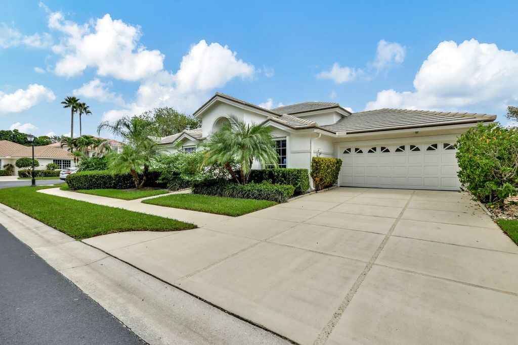Photo of 347 Eagleton Golf Drive, Palm Beach Gardens, FL 33418 (MLS # RX-11018486)
