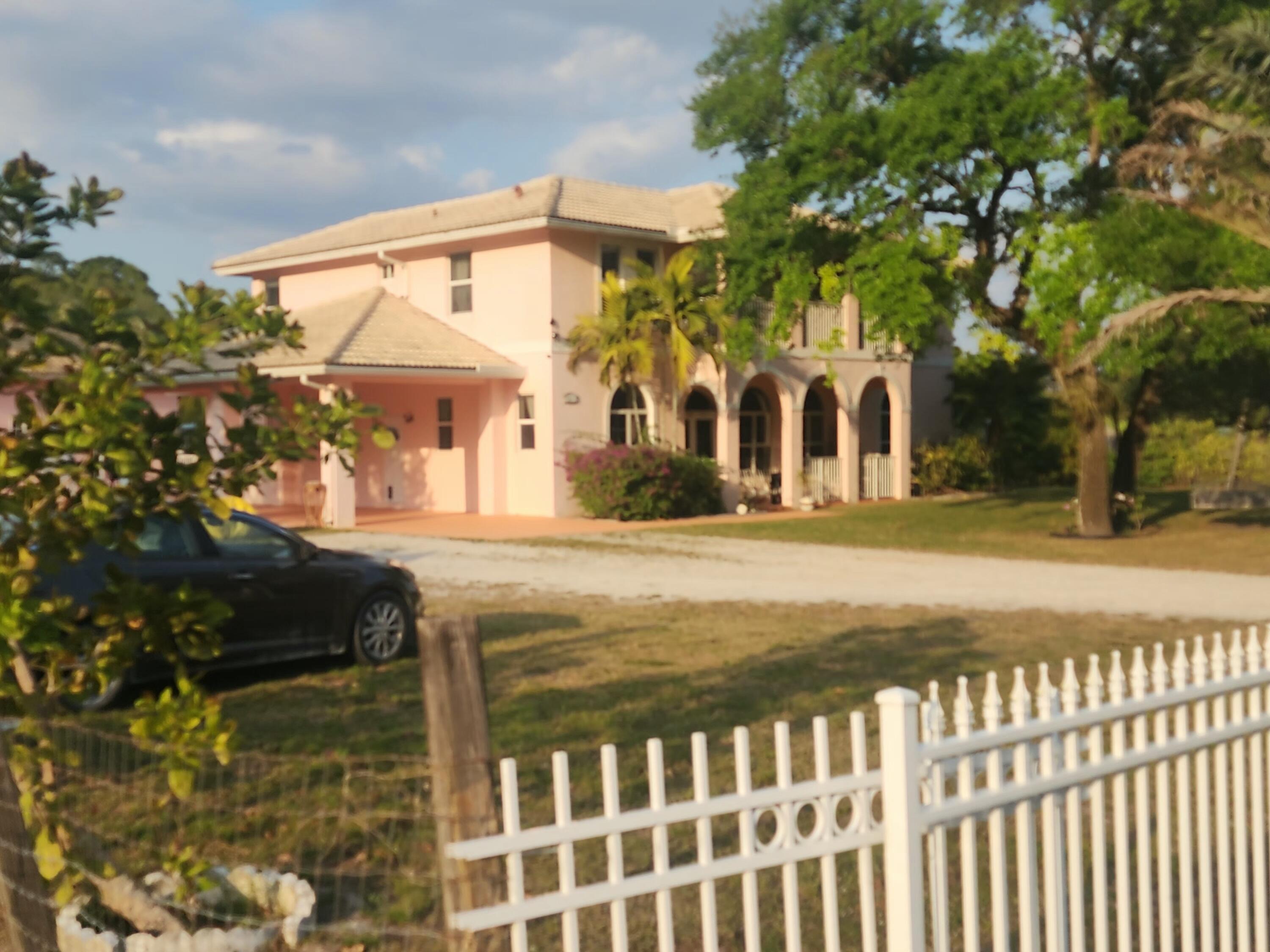 Property for Sale at 16975 83rd Place, The Acreage, Palm Beach County, Florida - Bedrooms: 4 
Bathrooms: 3.5  - $969,375