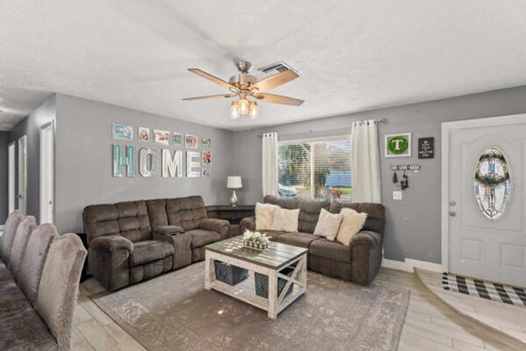 Photo of 5865 SE Rosemont Avenue E, Stuart, FL 34997 (MLS # RX-11062119)