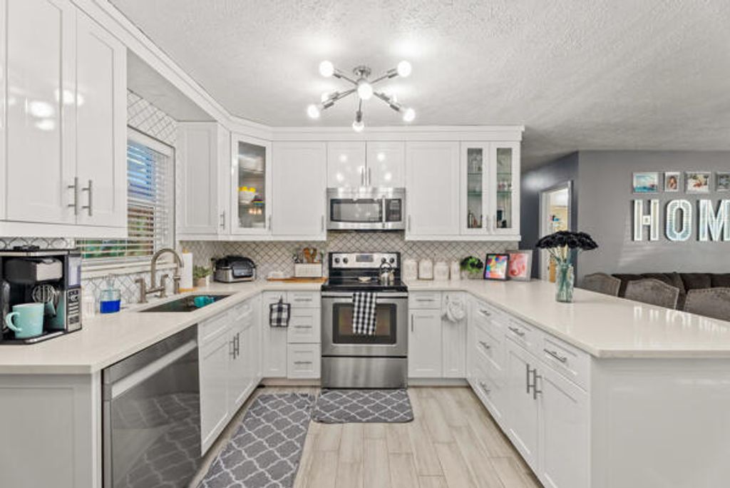 Photo of 5865 SE Rosemont Avenue E, Stuart, FL 34997 (MLS # RX-11062119)