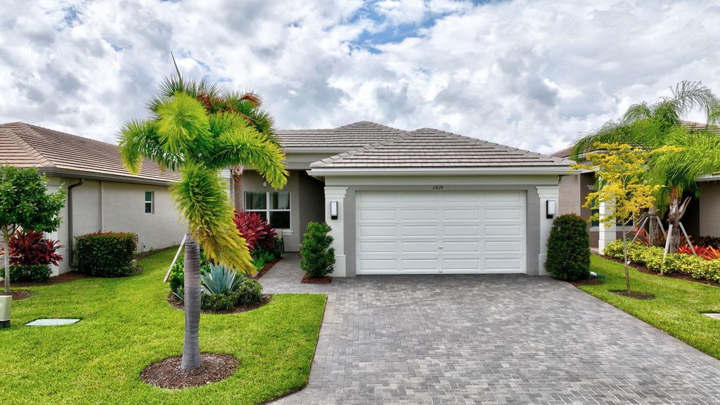 Photo of 11674 SW Moon River Way, Port Saint Lucie, FL 34987 (MLS # RX-11120152)