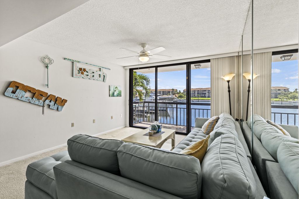 Photo of 2401 Marina Isle Way #205, Jupiter, FL 33477 (MLS # RX-11123210)
