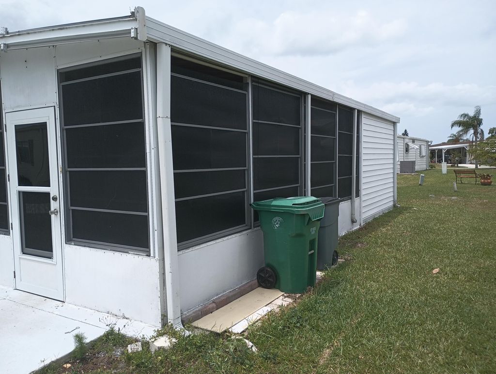 Photo of 5 Santa Fe Lane, Port Saint Lucie, FL 34952 (MLS # RX-11101285)