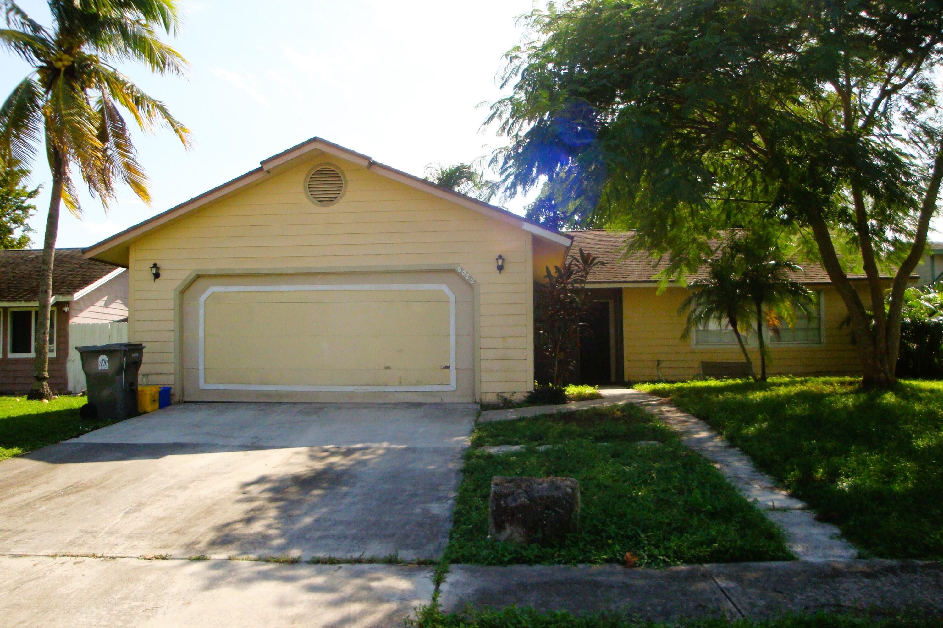 5022 El Claro Circle, West Palm Beach, Palm Beach County, Florida - 4 Bedrooms  
2 Bathrooms - 