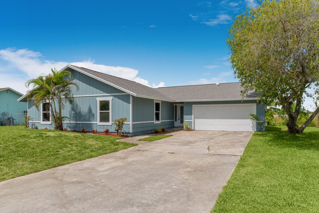 Photo of 101 Sandalwood Drive, Fort Pierce, FL 34947 (MLS # RX-10838327)