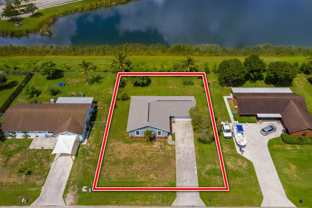 Photo of 101 Sandalwood Drive, Fort Pierce, FL 34947 (MLS # RX-10838327)