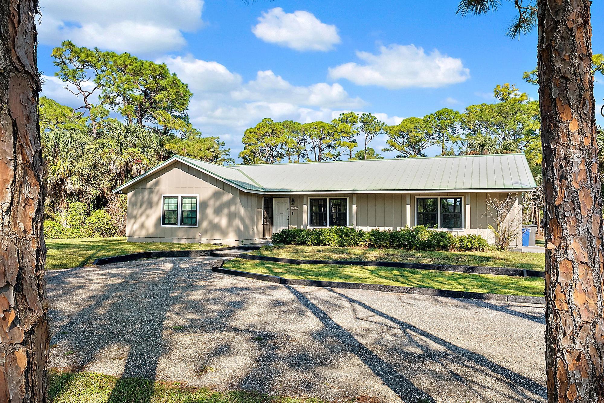11031 Persimmon Boulevard, West Palm Beach, Palm Beach County, Florida - 4 Bedrooms  
3 Bathrooms - 