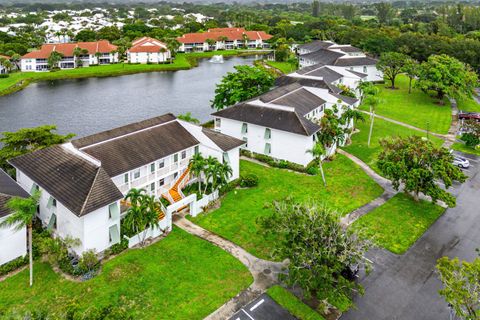Photo of 168 Cypress Point Drive, Palm Beach Gardens, FL 33418 (MLS # RX-11129336)