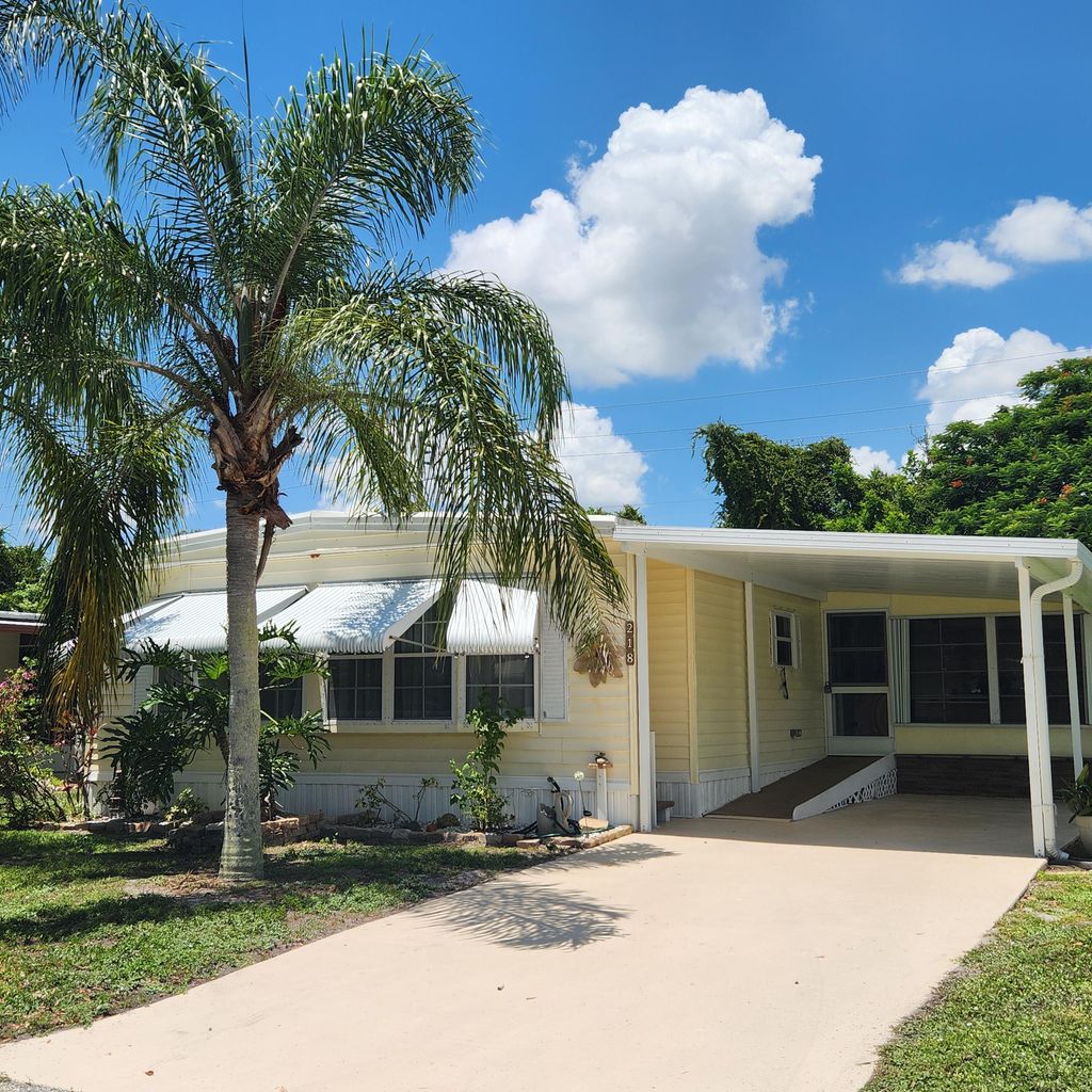 Photo of 218 W Caribbean, Port Saint Lucie, FL 34952 (MLS # RX-11111711)