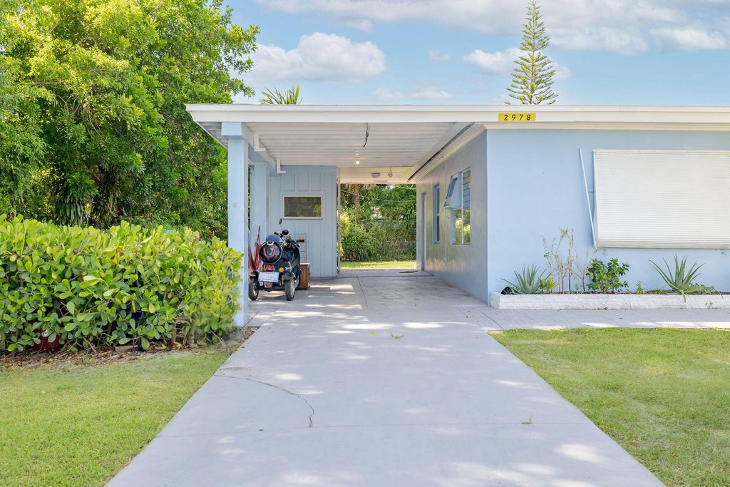 Photo of 2978 SE Normand Street, Stuart, FL 34997 (MLS # RX-11113056)