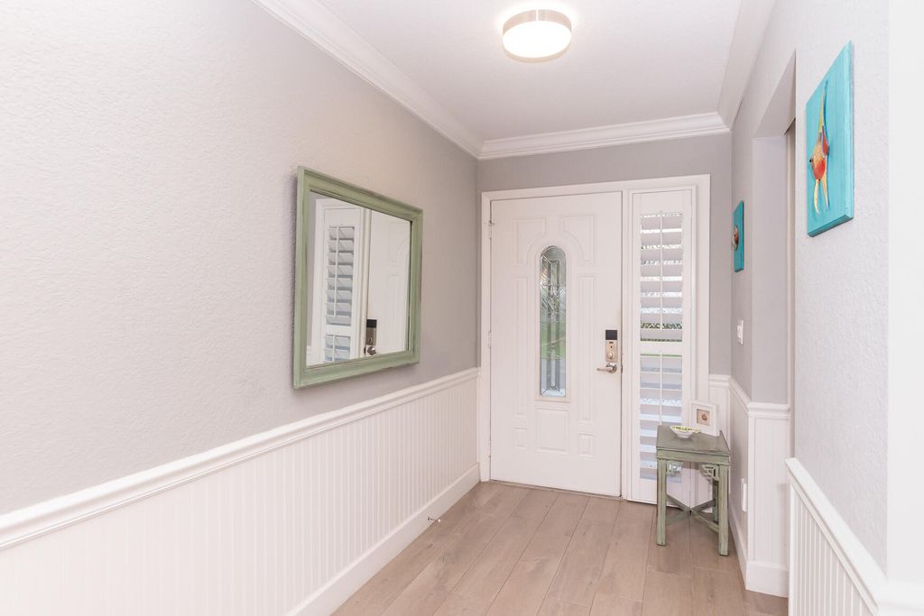 Photo of 4041 NE Breakwater Drive, Jensen Beach, FL 34957 (MLS # RX-11120482)